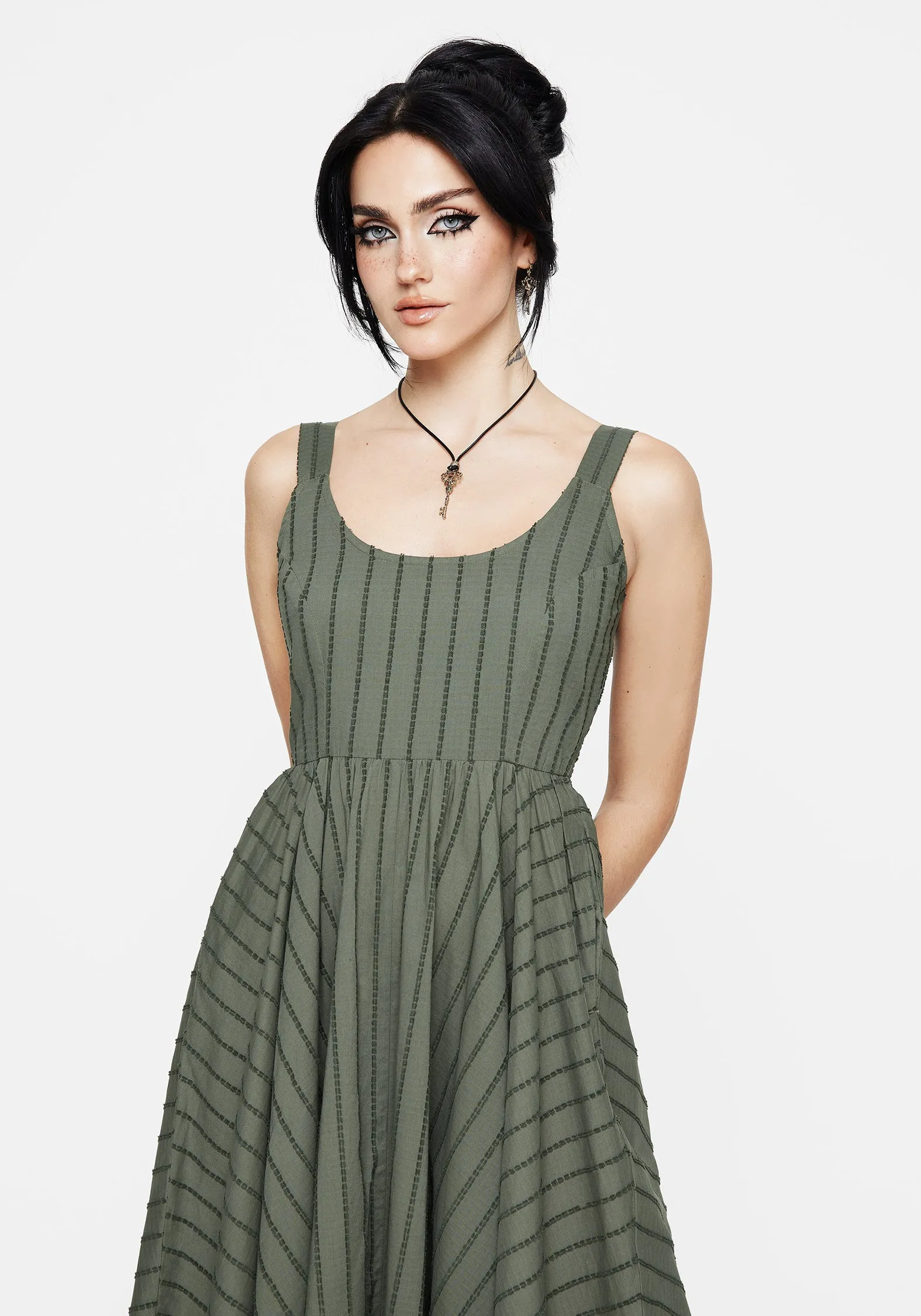 This dress provides a chic and comfortable fit that works for both formal and casual events Sunset Glow Blythe Cotton Handkerchief Hem Midaxi Dress - Green