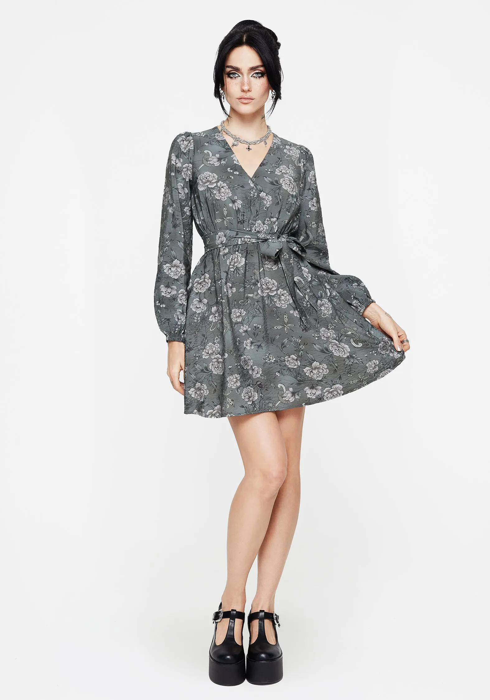 Sophisticated Style Meadow Floral Serpent Print Mini Wrap Dress