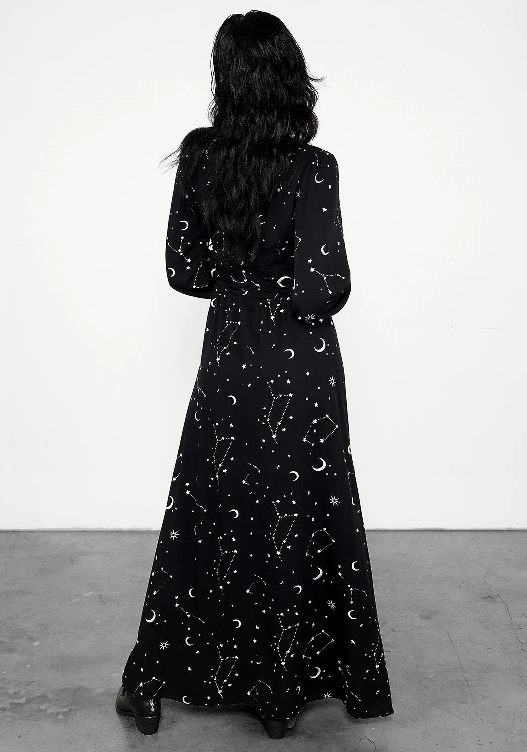 This dress features a classic design that works well for both day and night wear The flattering shape of this dress creates a beautiful silhouette that is perfect for all body types Silver Celestial Print Gathered Maxi Dress