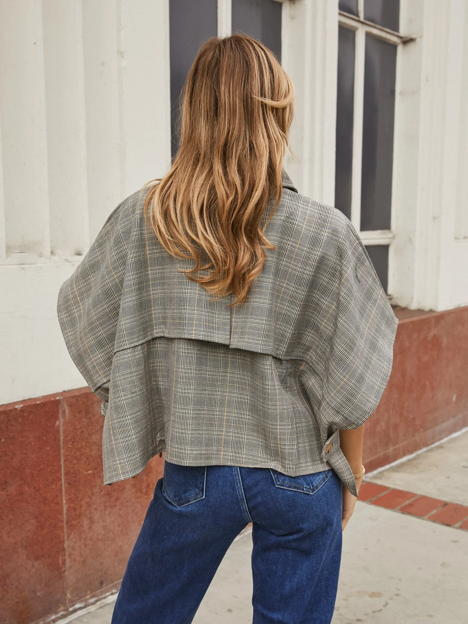 DoubleLayered Hem On the Town Plaid Cape Top - Final Sale